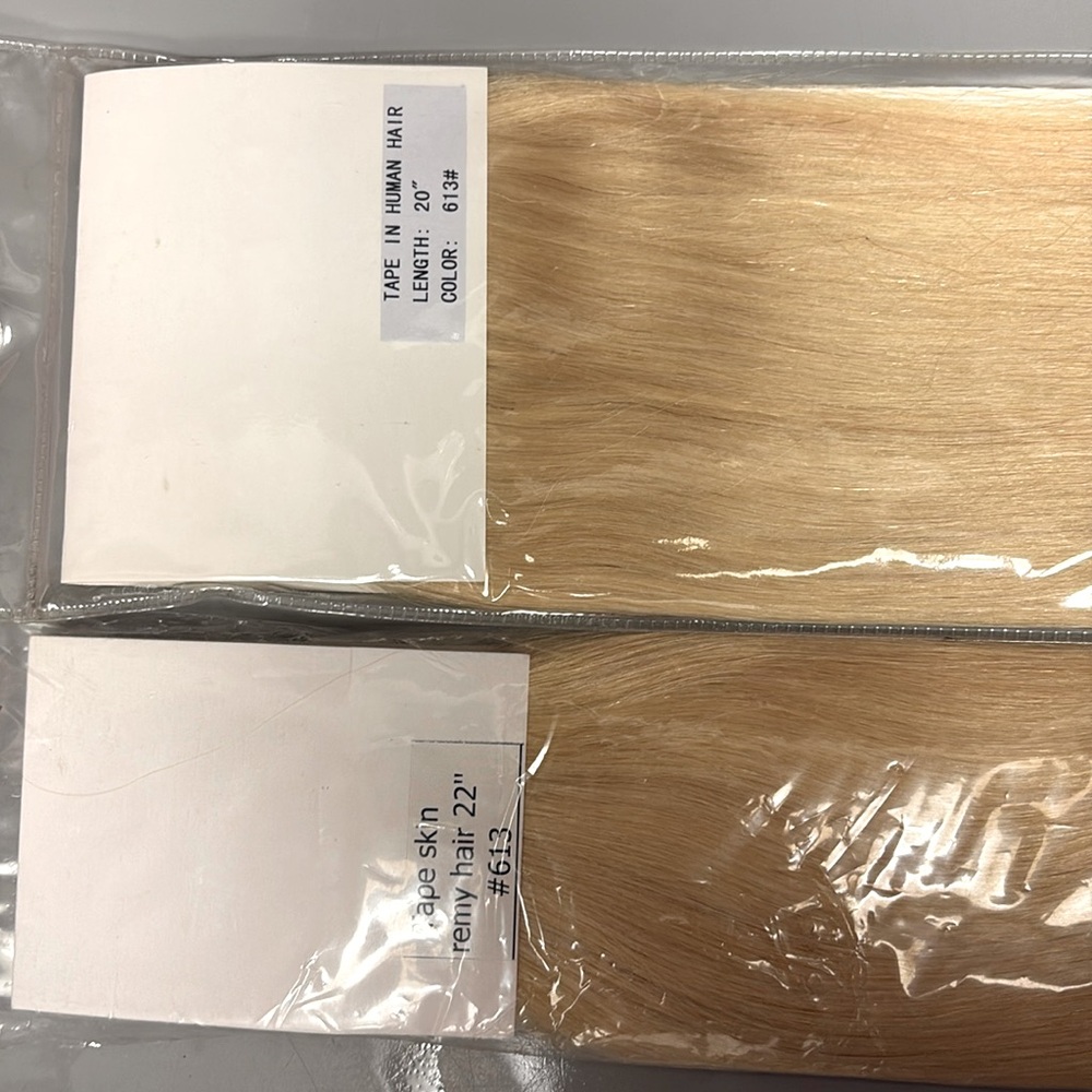 2 bundles Brand new tape in Human Hair extensions 20” and 22”